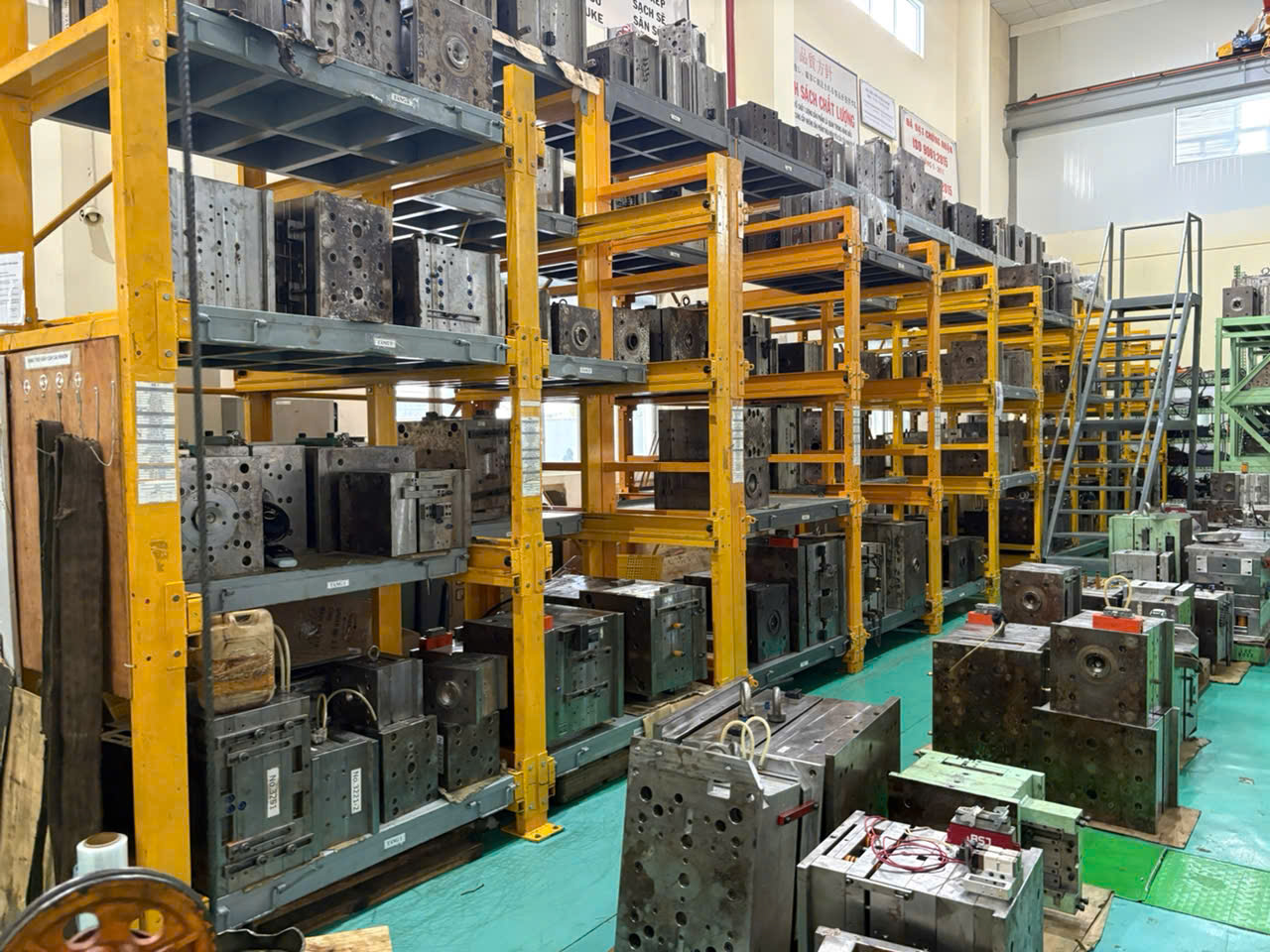 Organized mold shelving at audited Vietnam injection molding factory